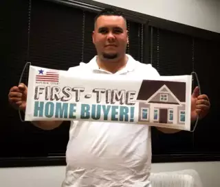 First time homebuyer celebrating the closing on his new home.